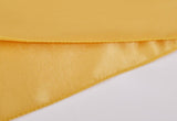 LOVWY 12 x 108-inch golden satin table runner with a white tablecloth